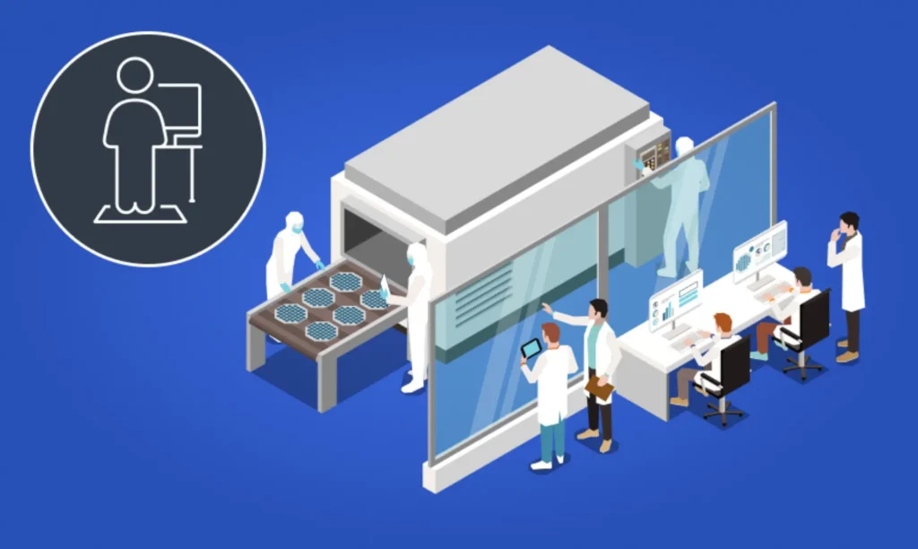 A group of researchers collaborates in a lab, operating a complex machine for scientific experiments.