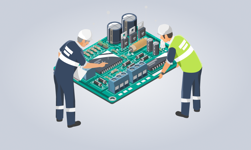 Two men collaboratively working on a circuit board, focused on assembling electronic components.