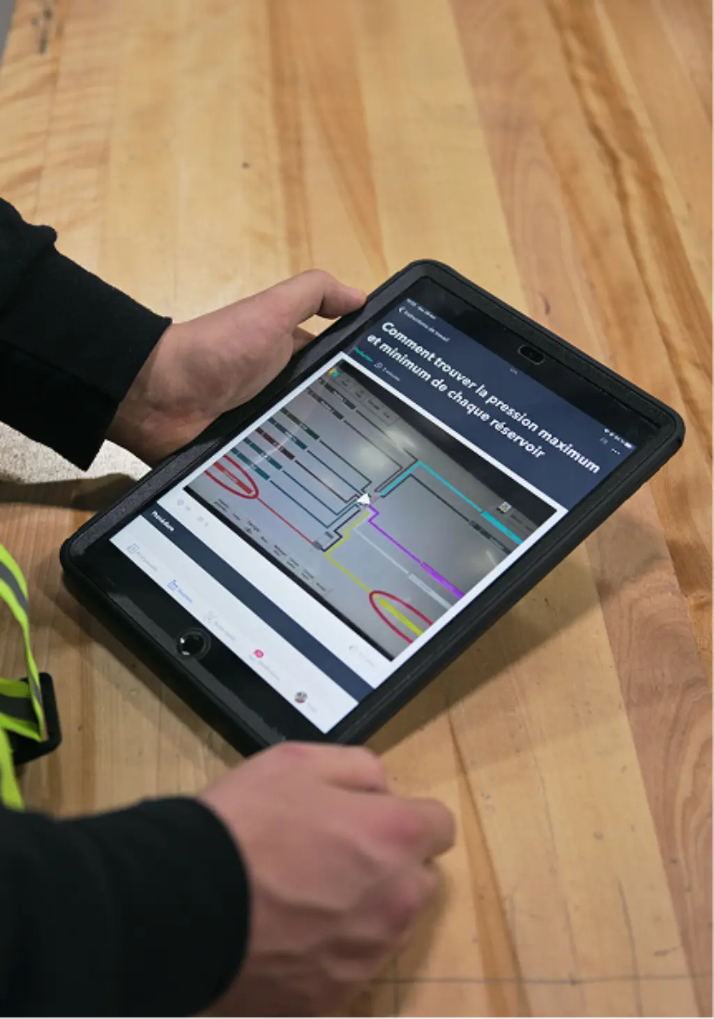 Image of a person using Poka Connected Worker Platform on an iPad.