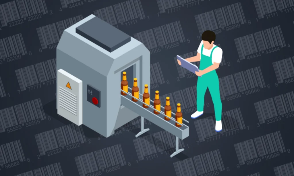 A man stands beside a machine that is producing bottles in a manufacturing setting.