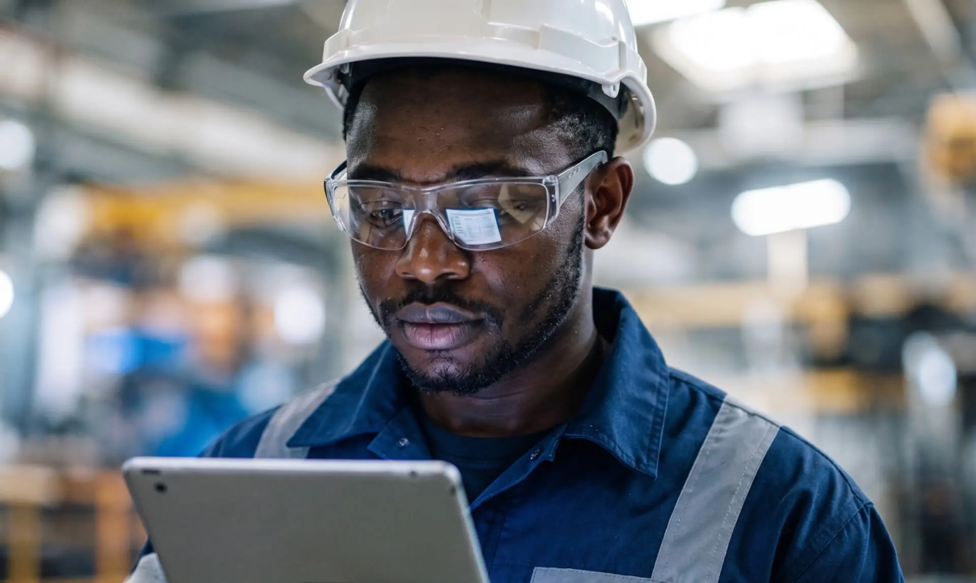 Man using tablet in warehouse